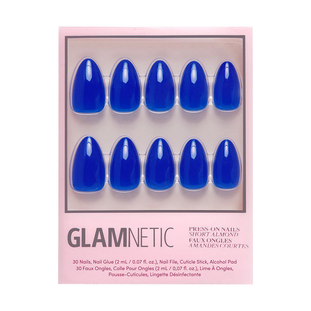 Glamnetic press-on nails with blue nail design on a pink packaging