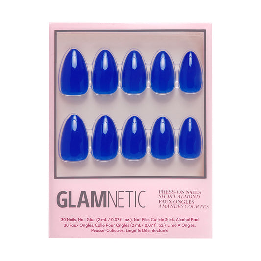 Glamnetic press-on nails with blue nail design on a pink packaging