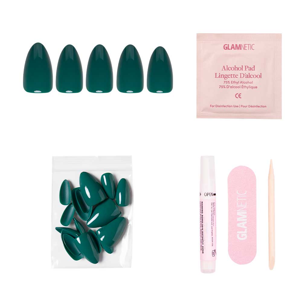Set of green nail tips, alcohol pad, and other items on a white background